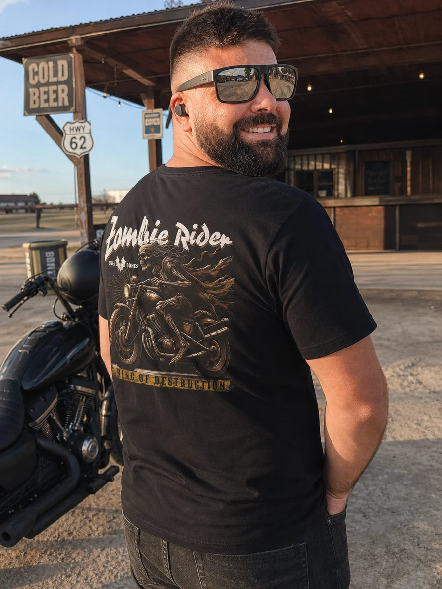 Ryan wearing the RIP MOTO Zombie Rider T-Shirt beside a motorcycle